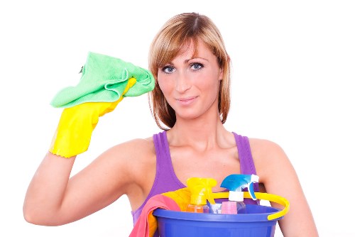 Cleaner preparing a booked cleaning service in a modern UK home