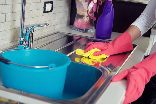 Ongoing cleaning of kitchen and bathroom areas in an Edgware property